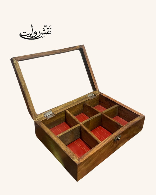 Wooden spice box.
