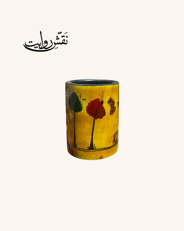 Wooden pen jar.